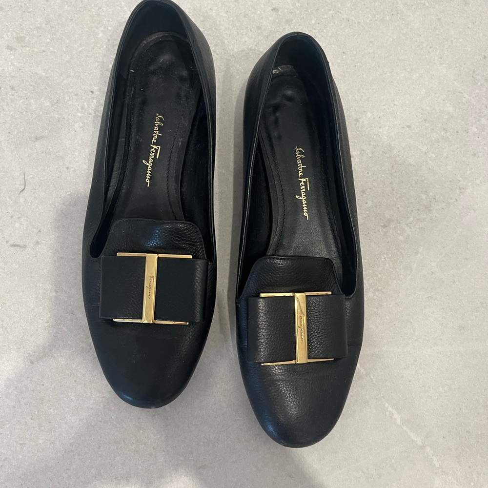 Salvatore Ferragamo Black Flats with Gold Buckle Bow